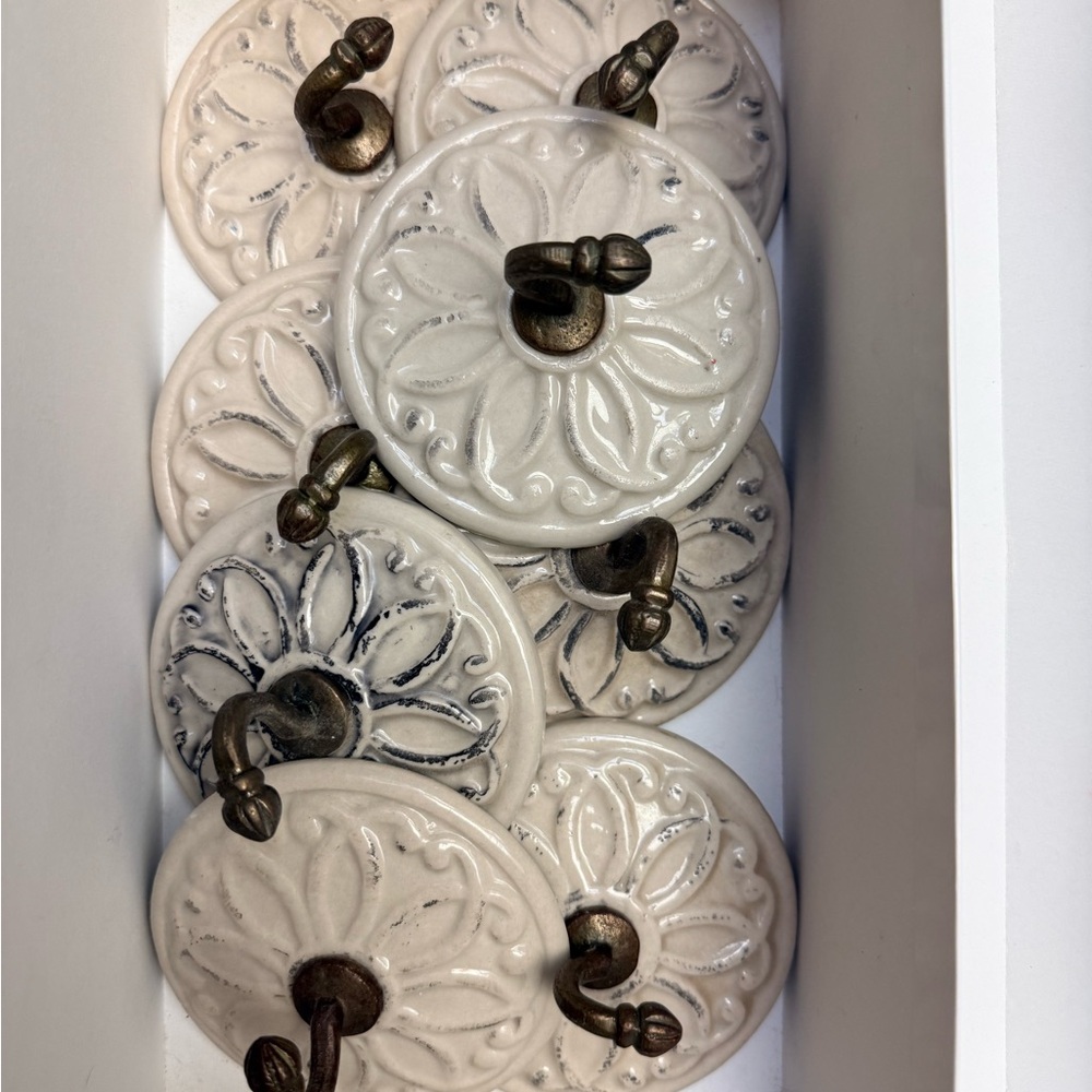 Cost Plus World Market Cream and Black with Bronze Wall Hooks
